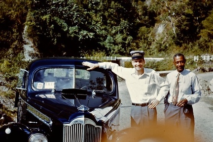 1955 February Lt (JG) Merrill and island tour driver in Jamaica - overheated Packard